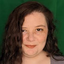 Headshot of Lauren Liebe in front of green background